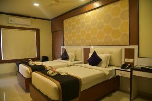 Кровать или кровати в номере Hotel Sonar Tori