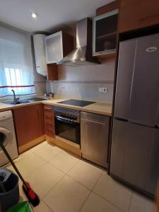 Kuchyňa alebo kuchynka v ubytovaní Apartamento con vistas al mar ideal para relajarte - AGUAMARINA I