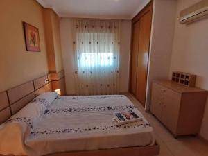 Posteľ alebo postele v izbe v ubytovaní Apartamento con vistas al mar ideal para relajarte - AGUAMARINA I