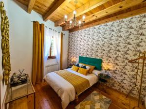 Postel nebo postele na pokoji v ubytování El Molino de la Ropería