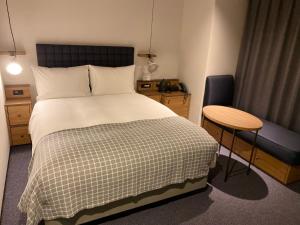 Postel nebo postele na pokoji v ubytování Hotel Resol Stay Akihabara