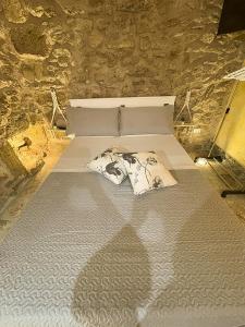 Postel nebo postele na pokoji v ubytování Agrimi b&b