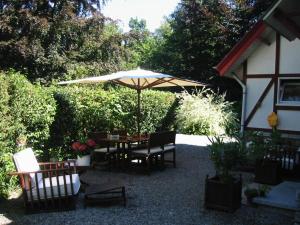 Aed väljaspool majutusasutust B&B Le Bois Dormant