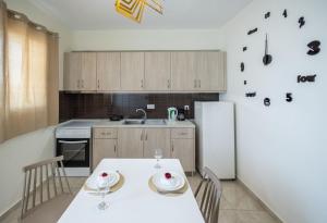Kuchyň nebo kuchyňský kout v ubytování FabView Studio Apartments