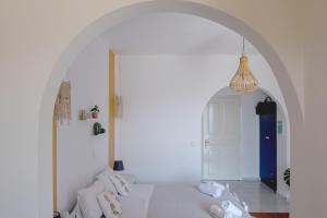 Voodi või voodid majutusasutuse Pefkides Aegina Boutique Apartments toas