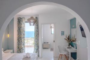 Voodi või voodid majutusasutuse Pefkides Aegina Boutique Apartments toas