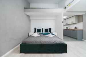Łóżko lub łóżka w pokoju w obiekcie Ice Apartments