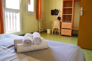 Ein Bett oder Betten in einem Zimmer der Unterkunft Village Vacances Le Junka