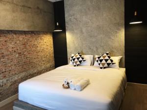 Postel nebo postele na pokoji v ubytování The Entaneer Poshtel
