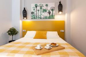 Posteľ alebo postele v izbe v ubytovaní Malaga Center Flat - SoHo Center Apartments