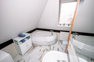 Kúpeľňa v ubytovaní Apartament Pastorówka + 12 fotografií