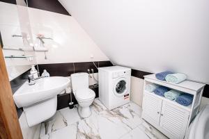 Kúpeľňa v ubytovaní Apartament Pastorówka