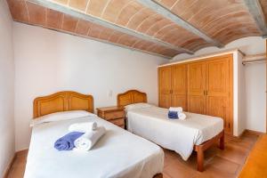 Posteľ alebo postele v izbe v ubytovaní Casa Can Pauma