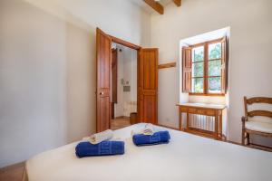 Posteľ alebo postele v izbe v ubytovaní Casa Can Pauma