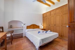 Posteľ alebo postele v izbe v ubytovaní Casa Can Pauma