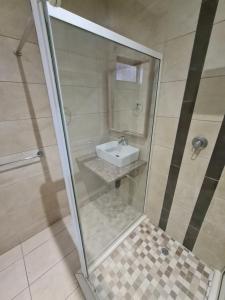 Ванная комната в Luxe on Ridge Boutique Hotel
