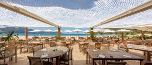 En restaurant eller et spisested på Hôtel-Restaurant Marina Di Lava - Grand Ajaccio