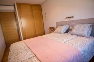 Łóżko lub łóżka w pokoju w obiekcie Penthouse La Palmita - Tazacorte, La Palma