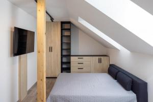 Postel nebo postele na pokoji v ubytování Apartmány Na Lánech
