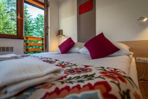 Posteľ alebo postele v izbe v ubytovaní Aparteo Apartamenty Strzelców Podhalańskich 34