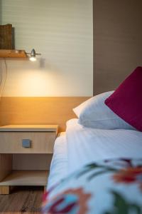 Posteľ alebo postele v izbe v ubytovaní Aparteo Apartamenty Strzelców Podhalańskich 34