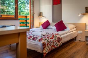Posteľ alebo postele v izbe v ubytovaní Aparteo Apartamenty Strzelców Podhalańskich 34