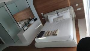 Un pat sau paturi într-o cameră la Ria Mar Lion