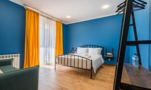 Postelja oz. postelje v sobi nastanitve Hotel Darchi Kazbegi