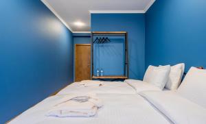 Postelja oz. postelje v sobi nastanitve Hotel Darchi Kazbegi