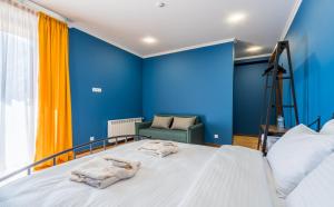 Postelja oz. postelje v sobi nastanitve Hotel Darchi Kazbegi