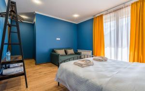 Postelja oz. postelje v sobi nastanitve Hotel Darchi Kazbegi