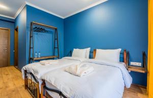 Postelja oz. postelje v sobi nastanitve Hotel Darchi Kazbegi