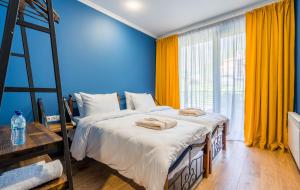 Postelja oz. postelje v sobi nastanitve Hotel Darchi Kazbegi