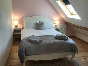 Кровать или кровати в номере La Grange Mignonne