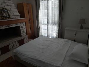 Postel nebo postele na pokoji v ubytování Wellness & Spa Hotel ACD Annex