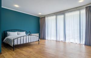 Postelja oz. postelje v sobi nastanitve Hotel Darchi Kazbegi