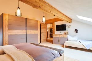 Postel nebo postele na pokoji v ubytování Haus Sonnblick