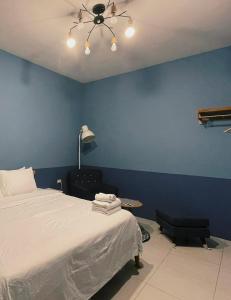 Ein Bett oder Betten in einem Zimmer der Unterkunft Donggang Homestay-Dongfan