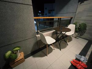 Ein Balkon oder eine Terrasse in der Unterkunft Donggang Homestay-Dongfan
