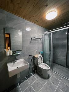 Ein Badezimmer in der Unterkunft Donggang Homestay-Dongfan