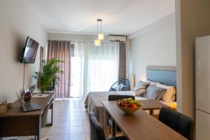 TV a/nebo společenská místnost v ubytování Greg's Home Volos