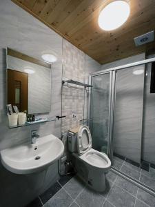 Ein Badezimmer in der Unterkunft Donggang Homestay-Dongfan