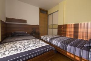Säng eller sängar i ett rum på Villa Novak