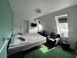 Postel nebo postele na pokoji v ubytování Krebshuset / Kelz0rdk + 37 fotografií