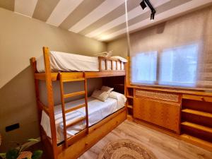A bed or beds in a room at Tierra Boutique, Tierra Suites y Tierra Valles Apartamentos