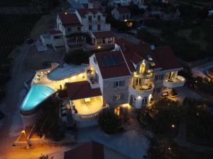 an overhead view of a house with a swimming pool at Villa Franka with swimming pool in Bol