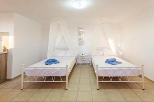 Voodi või voodid majutusasutuse Mani Summer Escape - Spacious Home, Fully equipped toas
