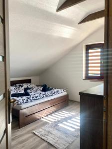 Giường trong phòng chung tại Chalet Rosa