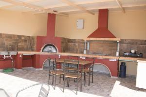 A kitchen or kitchenette at Villa Erofili Plakias south Rethimno Crete