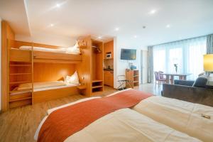 En eller flere senge i et værelse på Waldesblick, Hotel-Restaurant